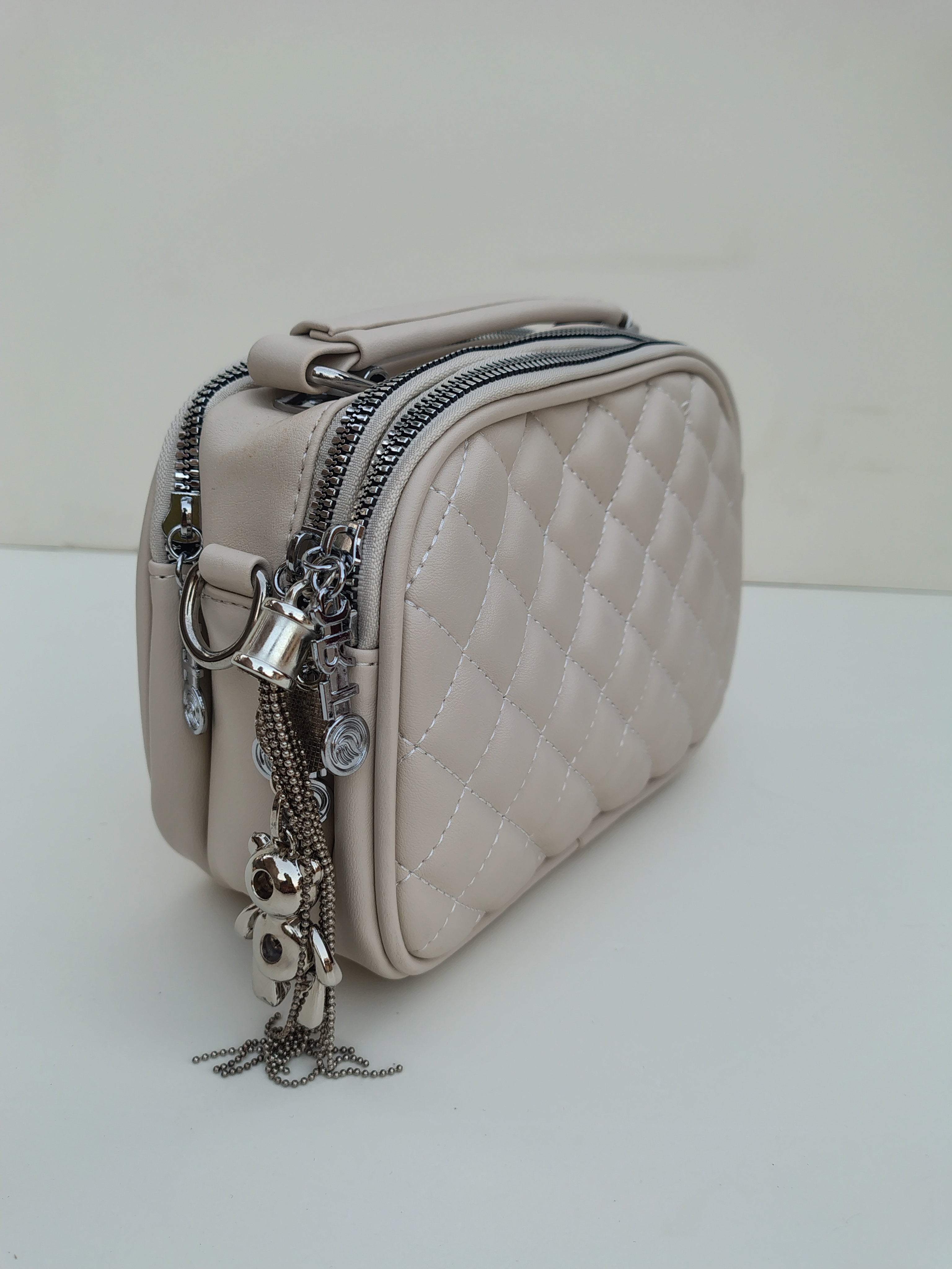 Beige Quilted Crossbody Bag – Dual Zip with Silver Charm Accent