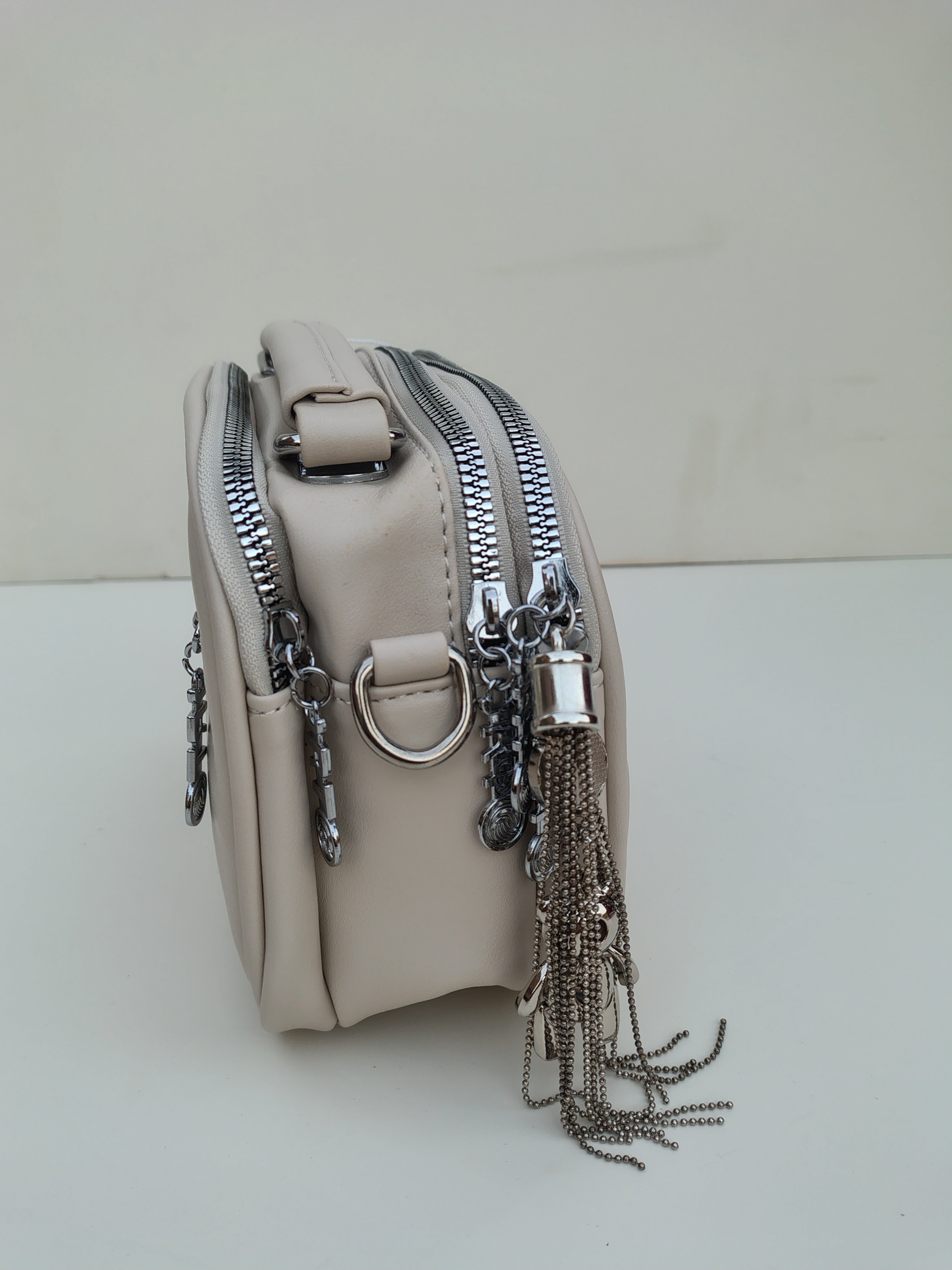 Beige Quilted Crossbody Bag – Dual Zip with Silver Charm Accent