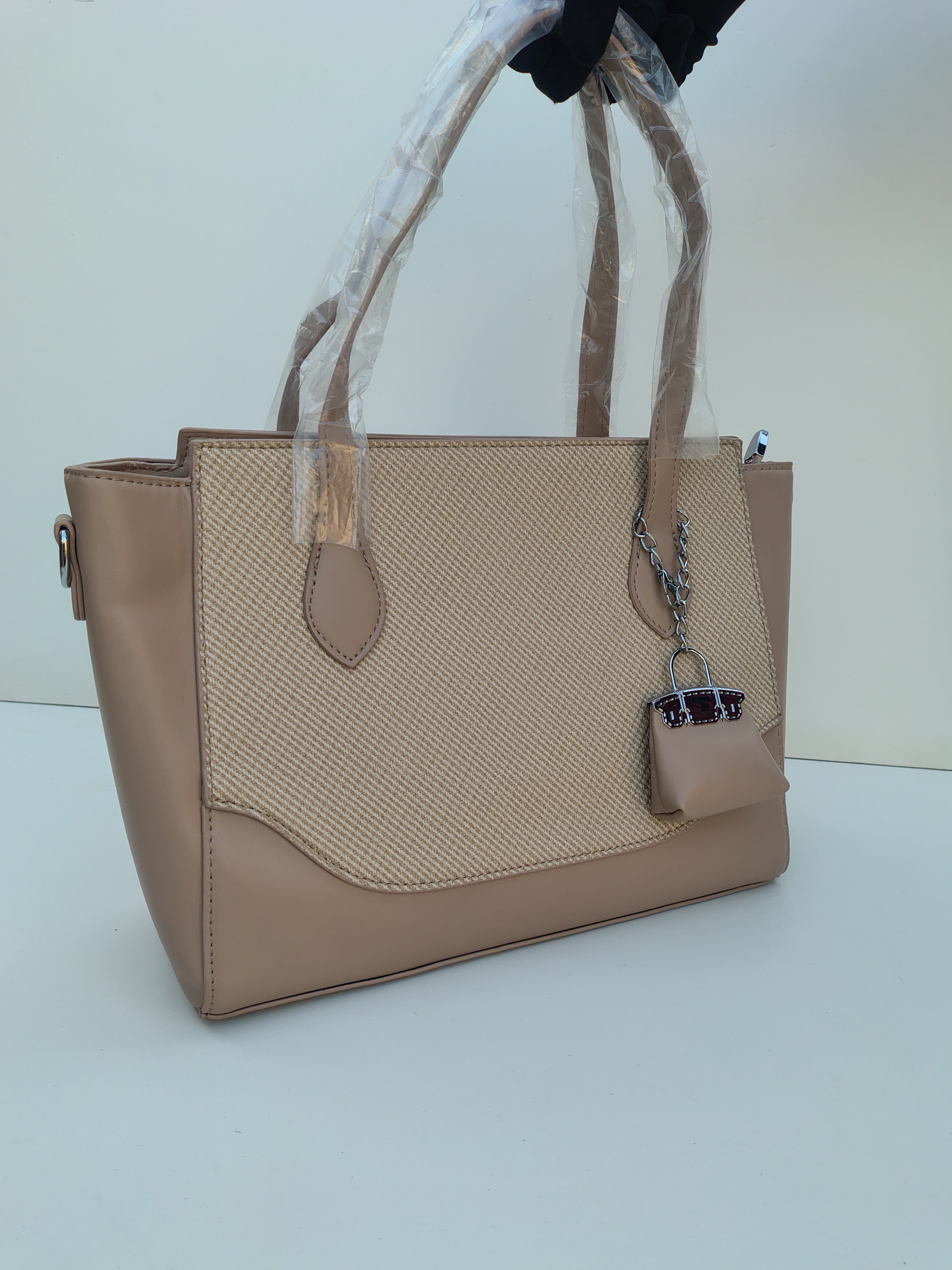 Beige Textured Tote Bag with Mini Charm – Elegant Neutral Handbag