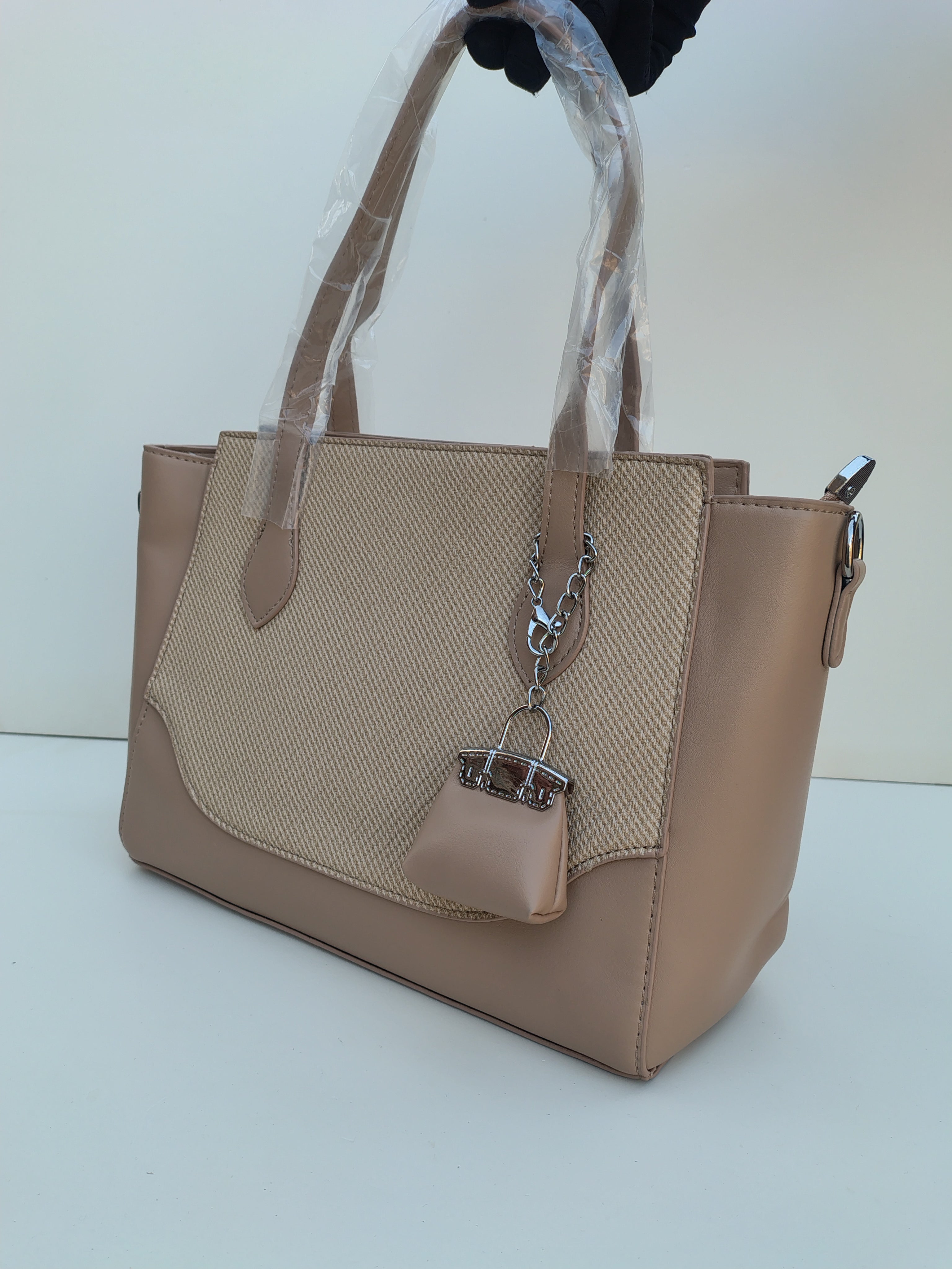 Beige Textured Tote Bag with Mini Charm – Elegant Neutral Handbag