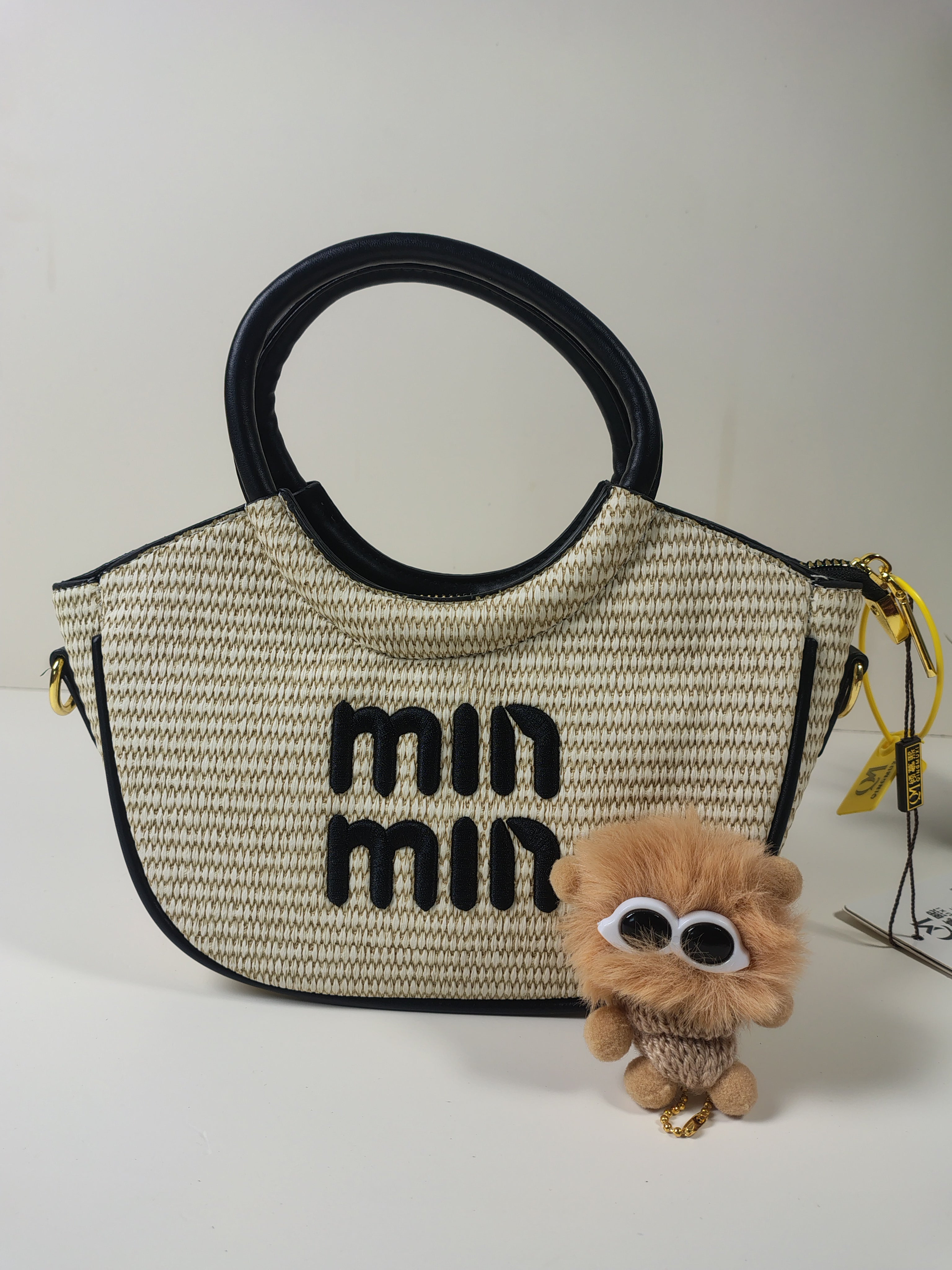 Min Min Woven Handbag with Plush Charm – Beige & Black