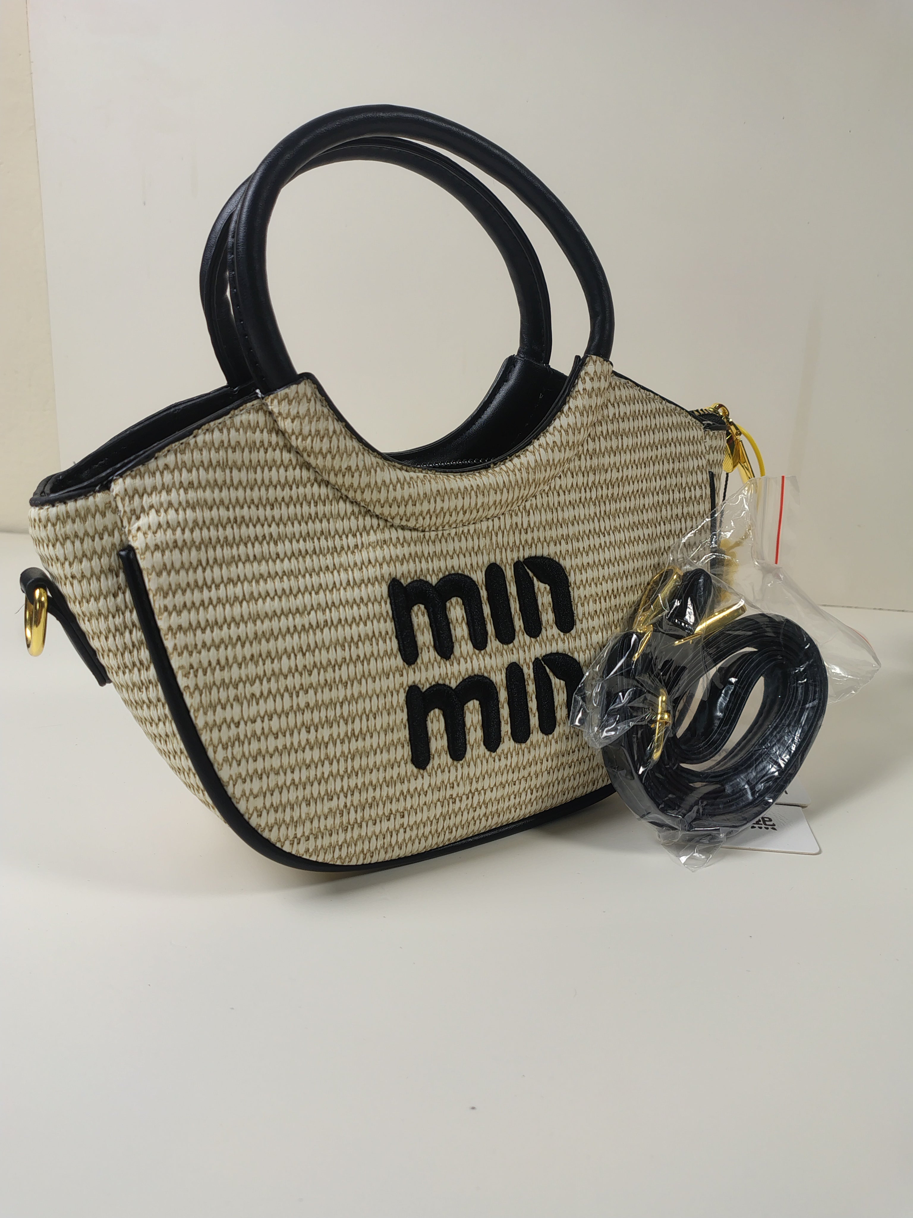 Min Min Woven Handbag with Plush Charm – Beige & Black