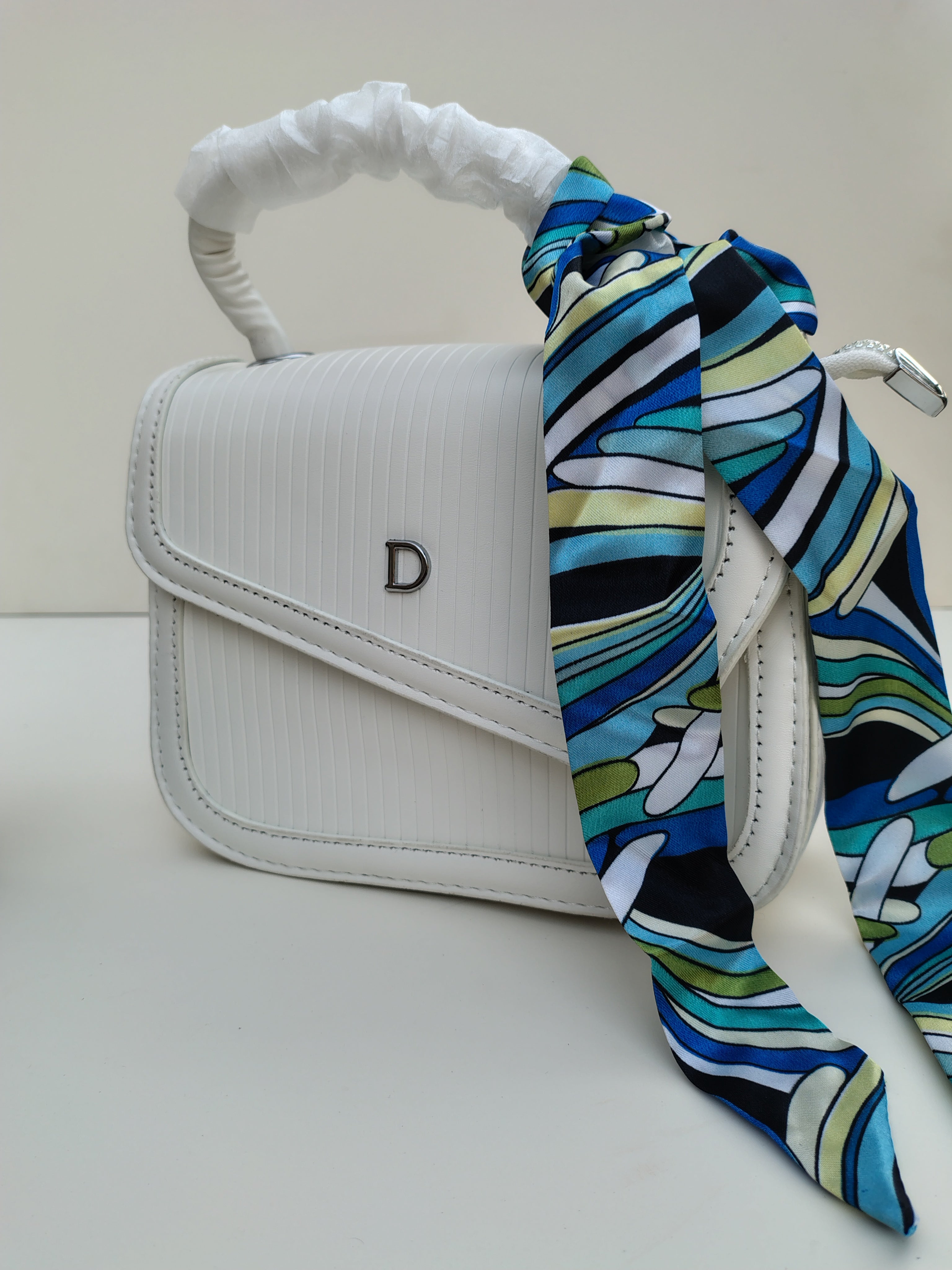 Classic White “D” Handbag – Minimalist Asymmetric Flap Design
