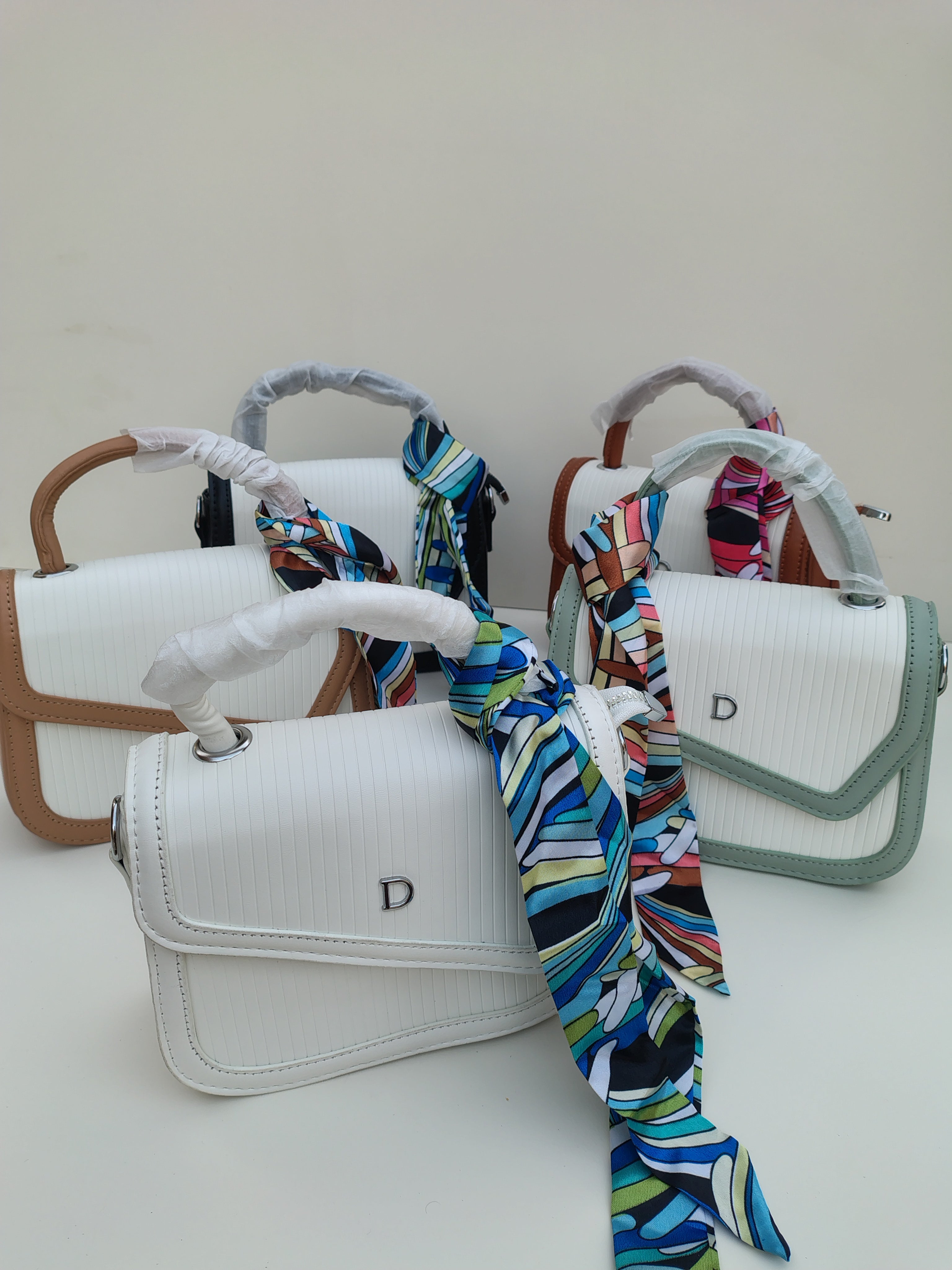 Classic White “D” Handbag – Minimalist Asymmetric Flap Design