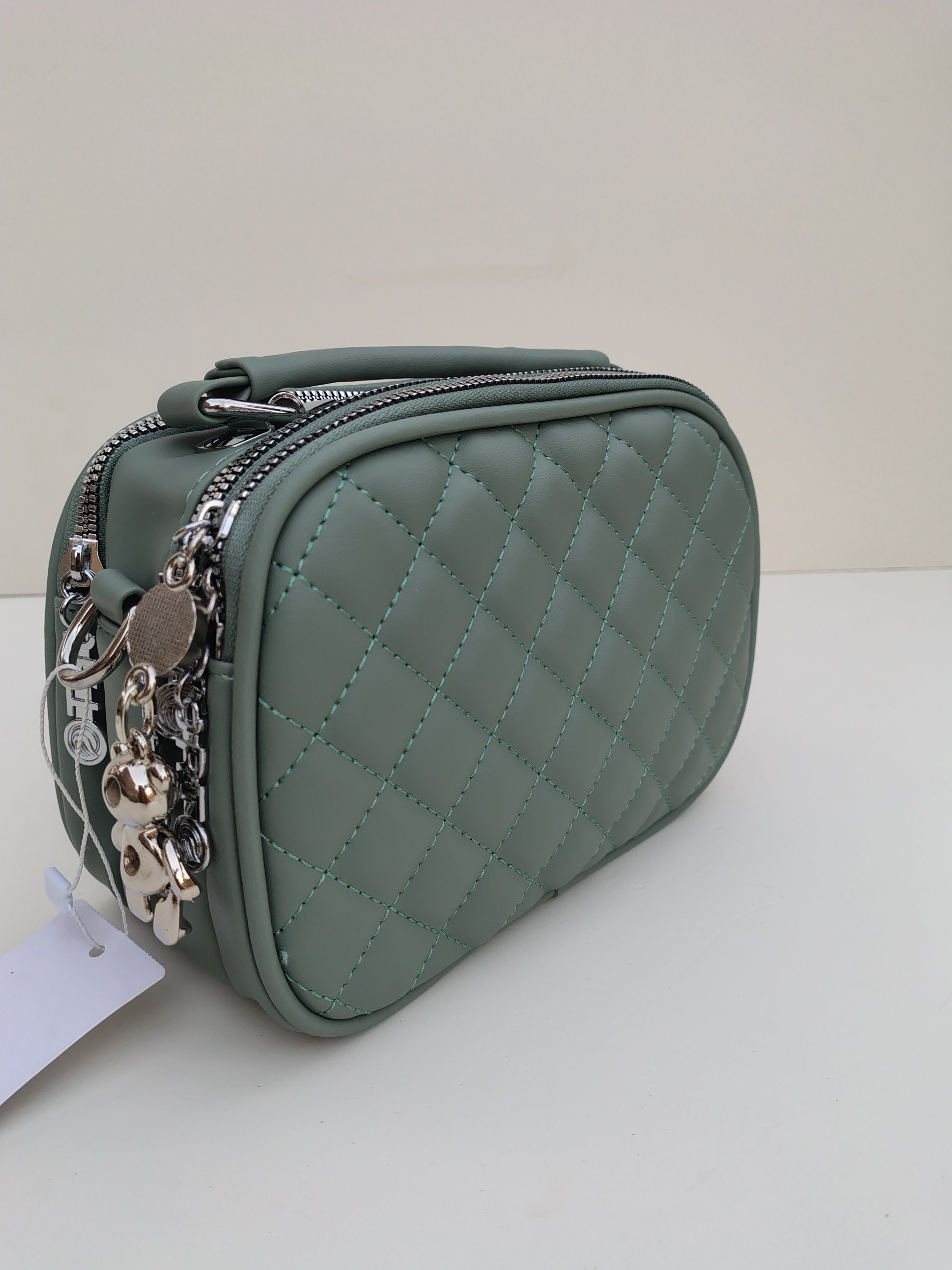 Sage Green Quilted Crossbody Bag – Charm Detail with Dual Zippers