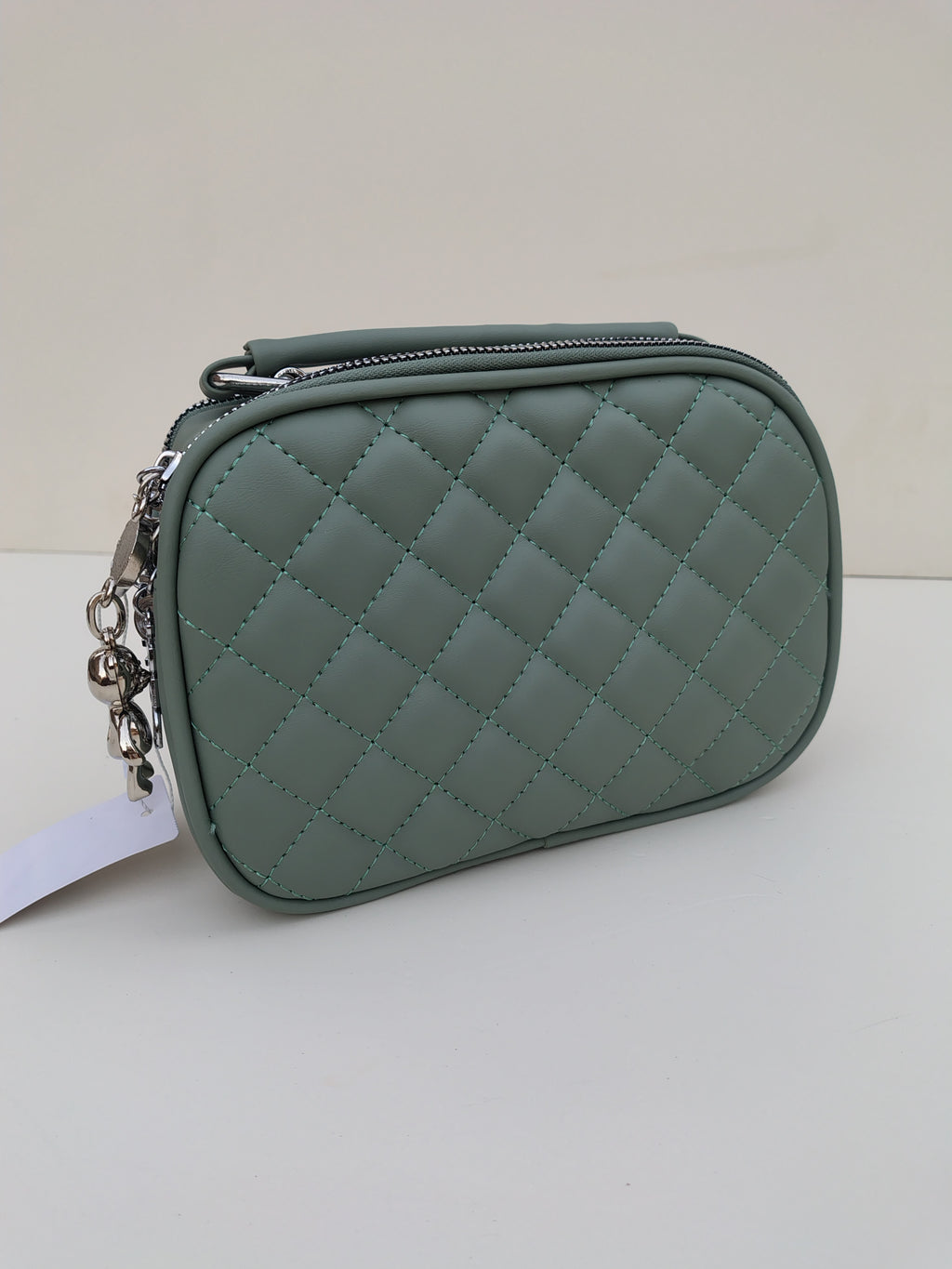 Sage Green Quilted Crossbody Bag – Charm Detail with Dual Zippers
