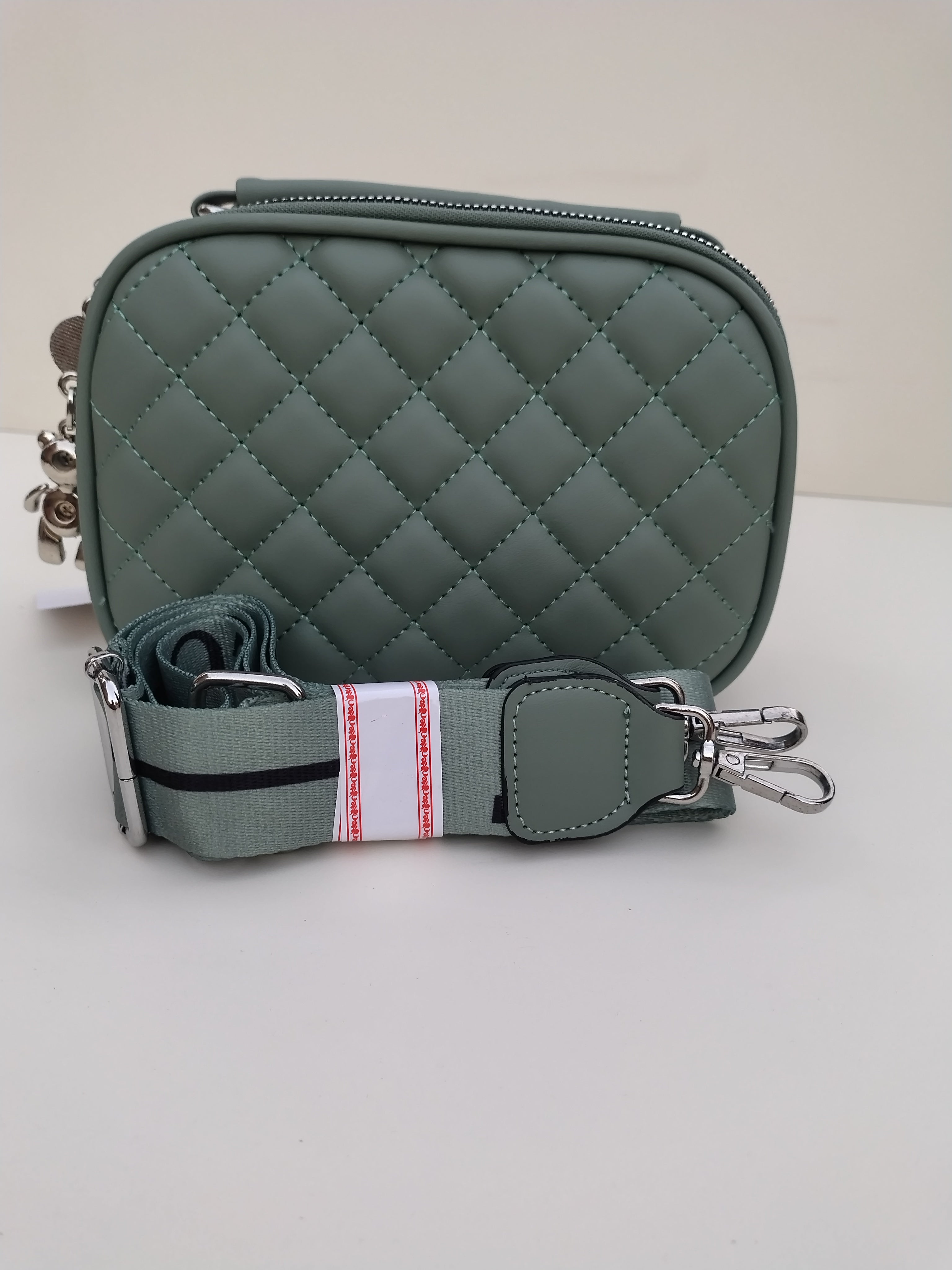 Sage Green Quilted Crossbody Bag – Charm Detail with Dual Zippers