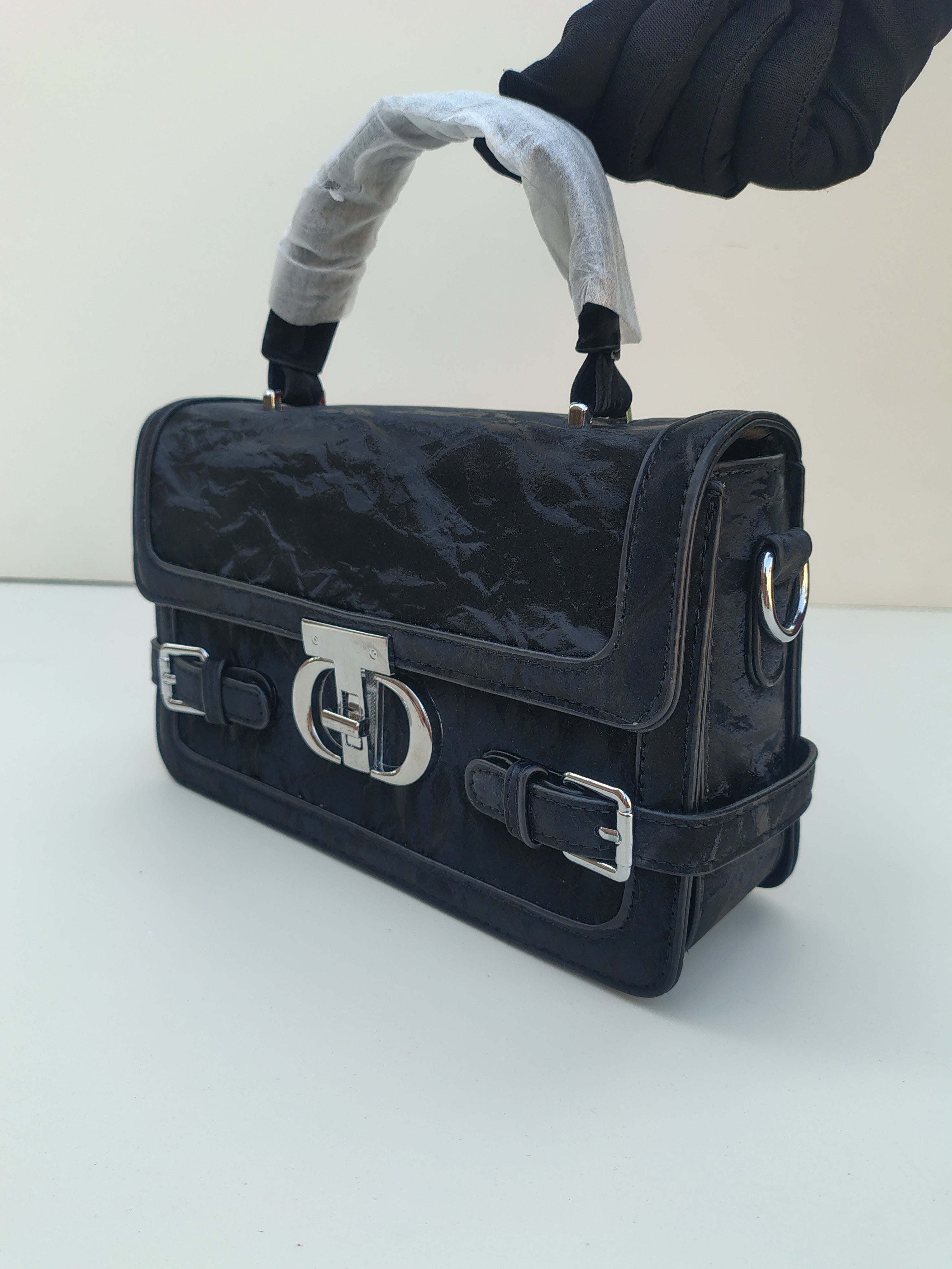 Black Luxe Buckle Handbag – Structured Design with Silver Accents