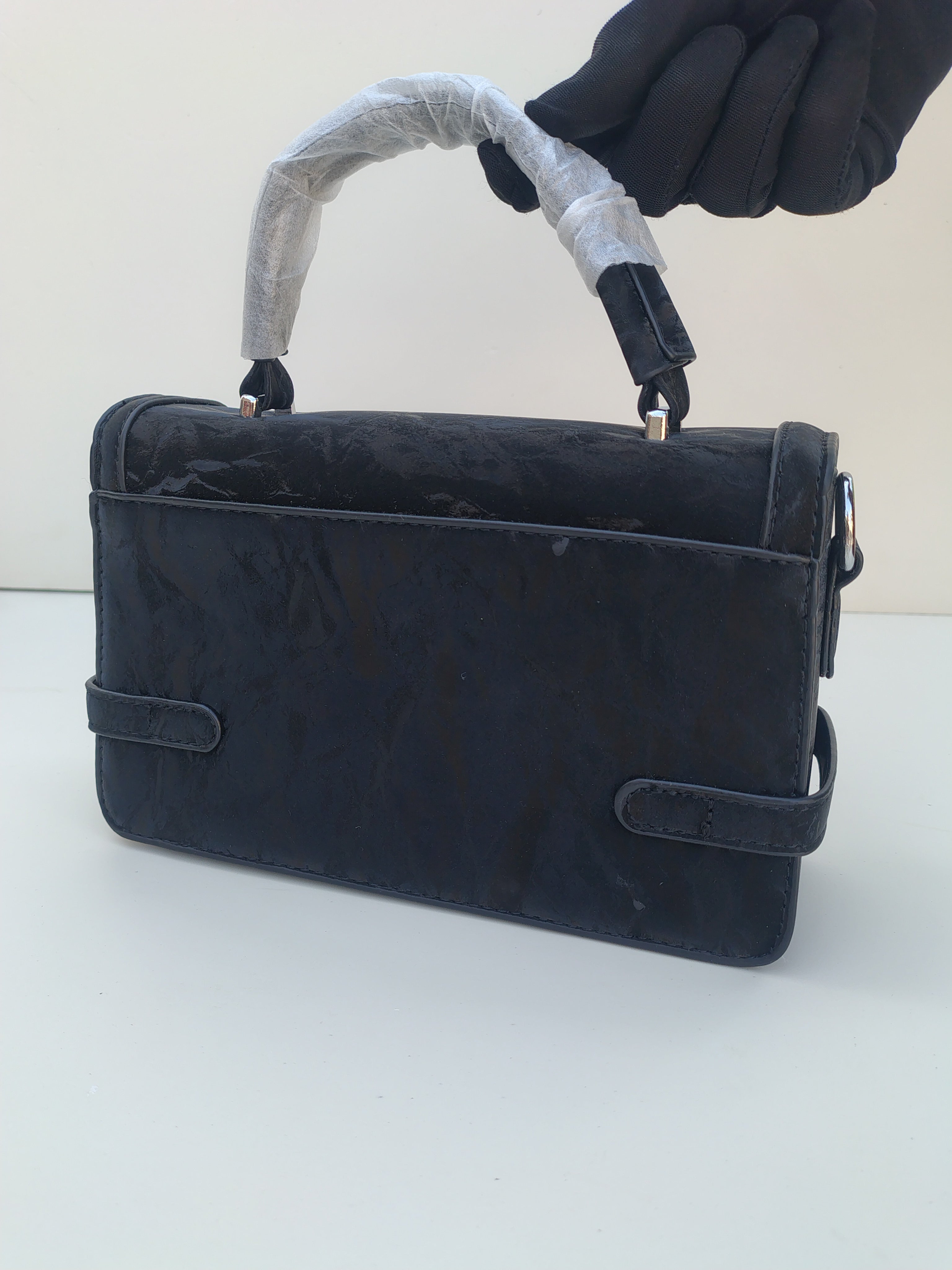 Black Luxe Buckle Handbag – Structured Design with Silver Accents