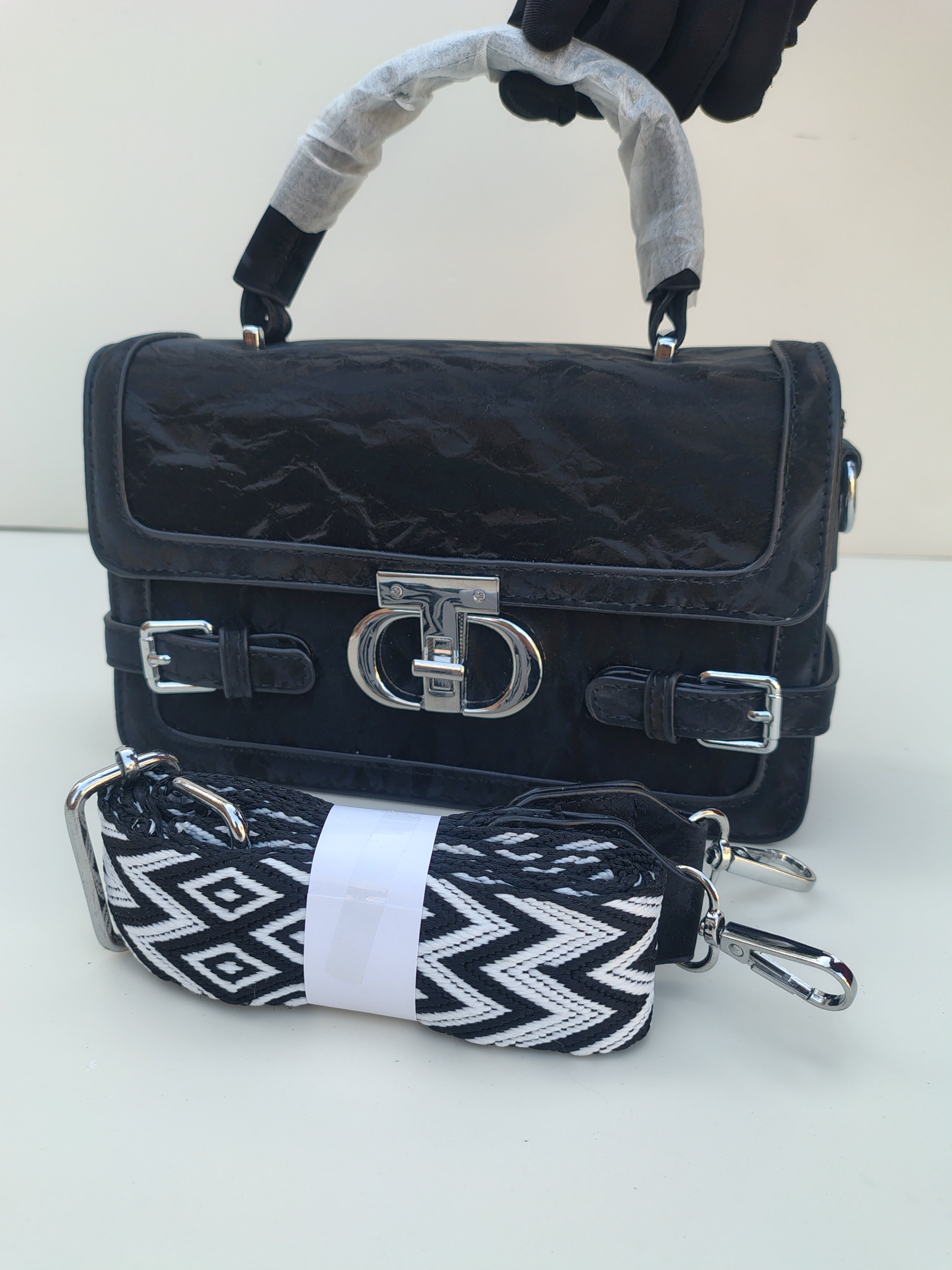 Black Luxe Buckle Handbag – Structured Design with Silver Accents