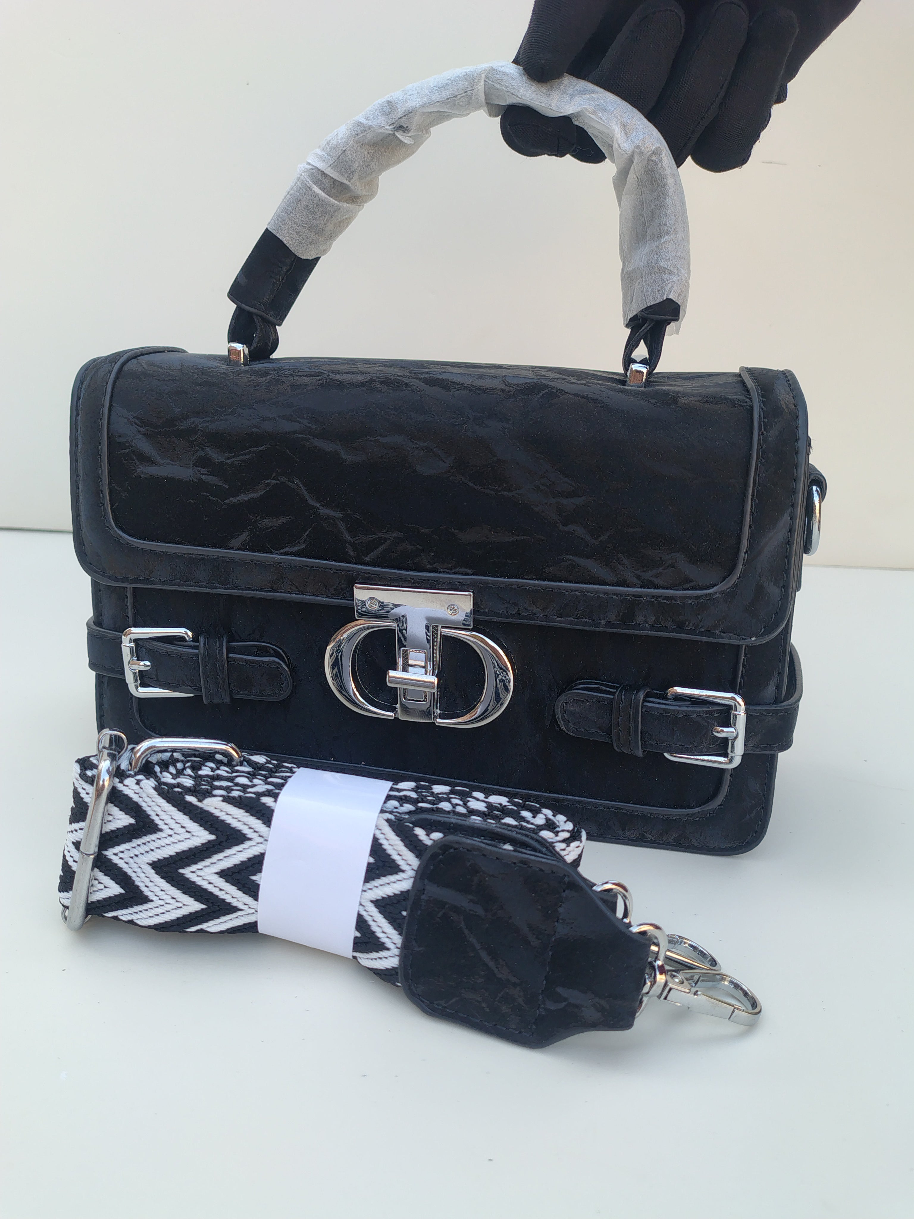 Black Luxe Buckle Handbag – Structured Design with Silver Accents