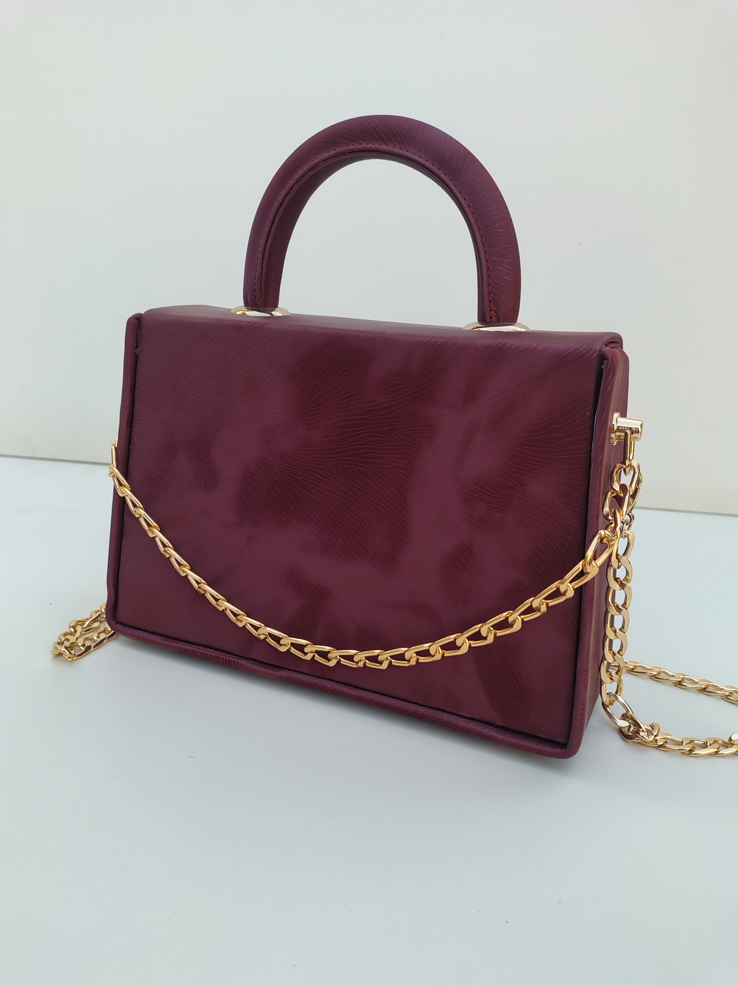 Wine Maroon Luxury Handbag – Gold Chain Evening Edition