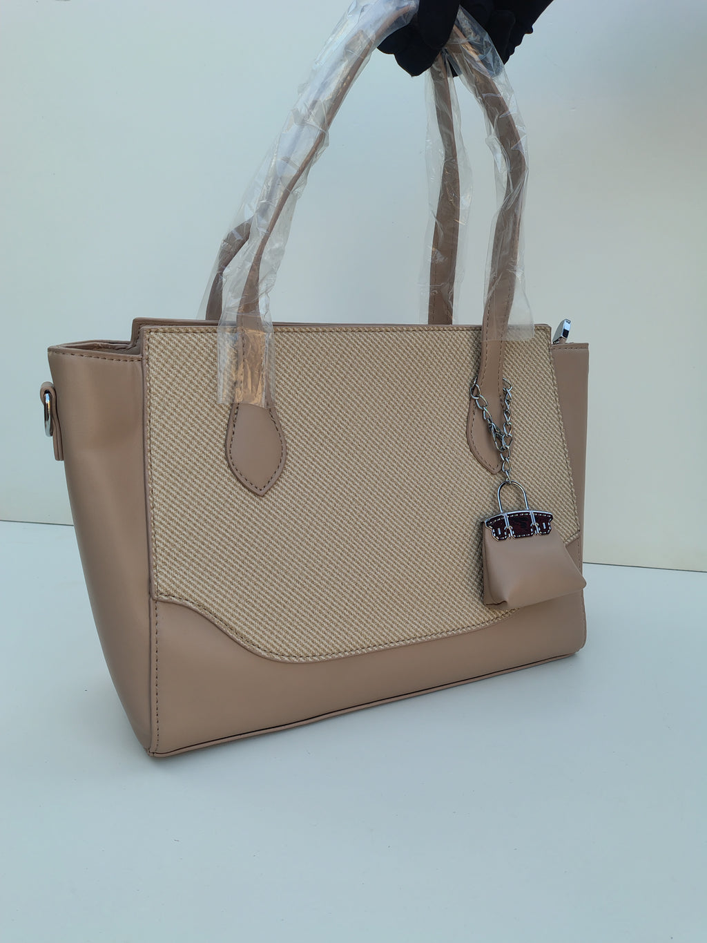 Beige Textured Tote Bag with Mini Charm – Elegant Neutral Handbag